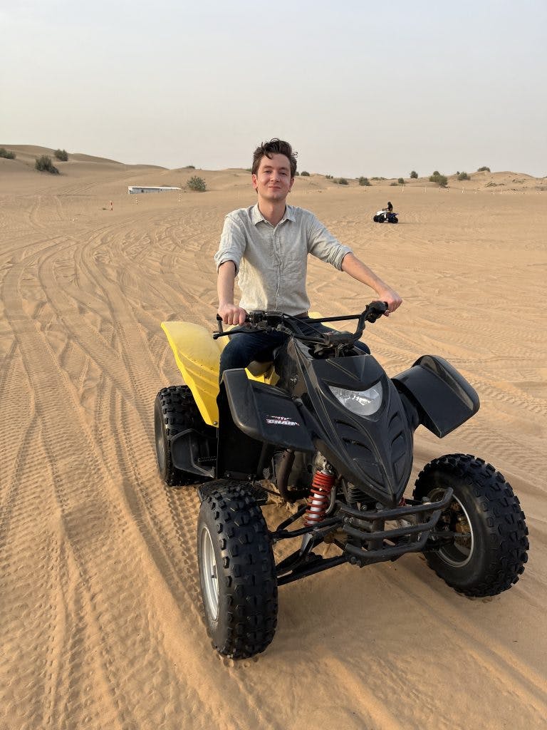 David in the deserts of Dubai